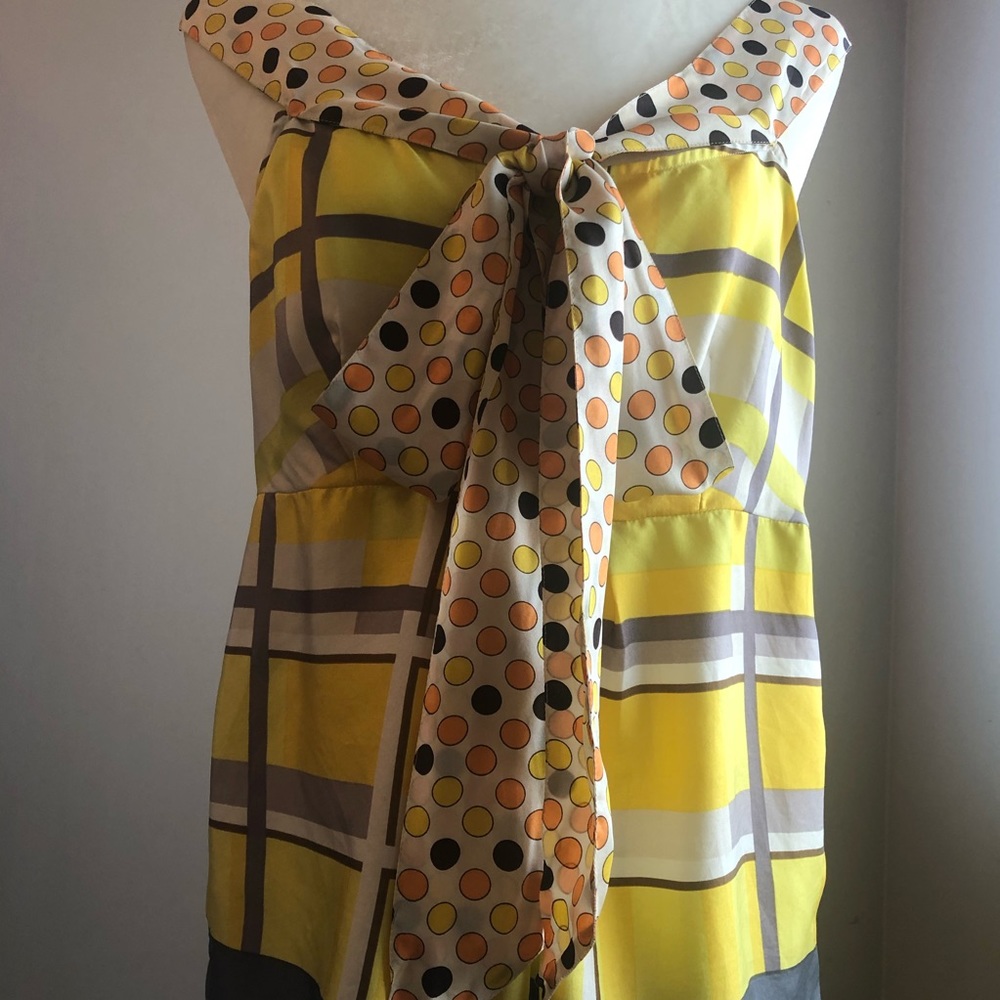 Anthropologie silk top with front tie bow.